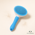 Blue and white self-cleaning slicker brush for dogs