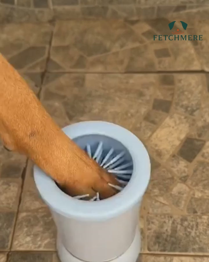 Fetchmere dog paw cleaner cup in use after a muddy walk